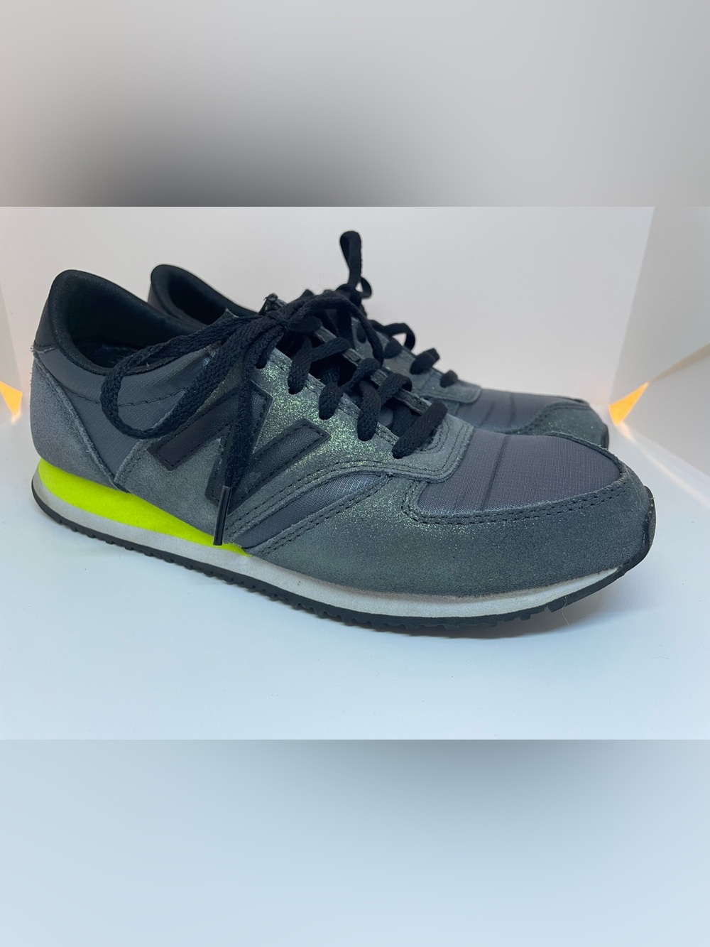New Balance Women’s Glittery Black/Gray Sneakers with Neon Yellow Accent